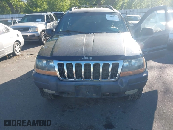 1999 Jeep Grand Cherokee Laredo with VIN 1J4GW58S0XC538913, listed as a IAAI auction lot 42684467 with 241,252 mi miles and . Bid and sale history available at DreamBid. Image 6.
