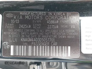 2013 Kia Optima Hybrid EX with VIN KNAGM4AD3D5057701, listed as a IAAI auction lot 42111647 with 160,426 mi miles. Bid and sale history available at carsss.com. Image 9.
