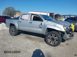 2013 Toyota Tacoma PreRunner z VIN 5TFJX4GN4DX023920, wystawiony jako IAAI lot #41664480 z przebiegiem 157 605 mil mil oraz . Historia ofert i sprzedaży dostępna na DreamBid. Obrazek 1.