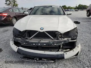 2020 BMW 3 Series 330i with VIN WBA5R1C0XLFH39262, listed as a Copart auction lot 57398585 with 55,456 mi miles and Salvage title. Bid and sale history available at DreamBid. Image 5.