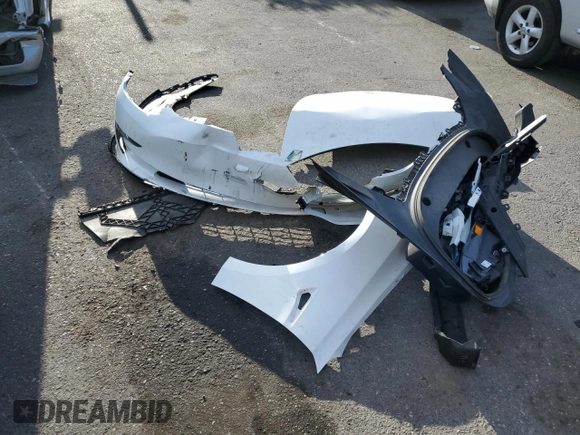 2020 Tesla Model 3 Standard Range Plus with VIN 5YJ3E1EA0LF808571, listed as a Copart auction lot 47827615 with 125,444 mi miles and Salvage Title. Bid and sale history available at DreamBid. Image 12.