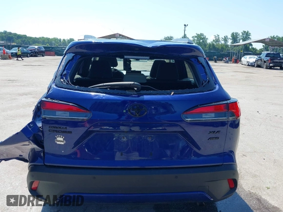 2022 Toyota Corolla Cross XLE z VIN 7MUDAABG4NV004836, wystawiony jako IAAI lot #42546573 z przebiegiem 23 821 mil mil oraz . Historia ofert i sprzedaży dostępna na DreamBid. Obrazek 16.