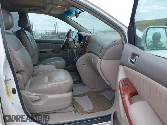 2004 Toyota Sienna XLE with VIN 5TDZA22CX4S141877, listed as a IAAI auction lot 42135971 with 219,688 mi miles. Bid and sale history available at carsss.com. Image 5.