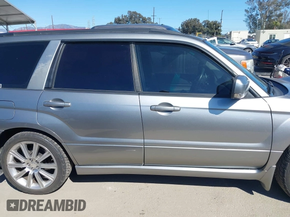 2007 Subaru Forester Sports XT with VIN JF1SG69687H733459, listed as a IAAI auction lot 41827464 with 139,943 mi miles. Bid and sale history available at carsss.com. Image 13.