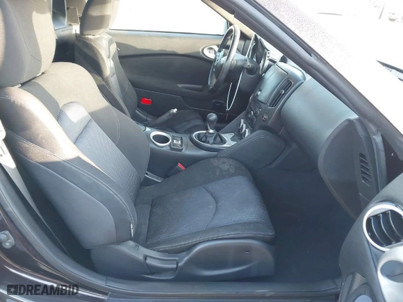 2010 Nissan 370Z Touring with VIN JN1AZ4FHXAM301421, listed as a IAAI auction lot 41642045 with 89,963 mi miles. Bid and sale history available at carsss.com. Image 5.