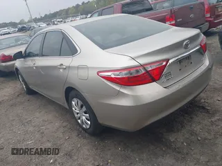 2015 Toyota Camry XLE with VIN 4T1BF1FK2FU992015, listed as a IAAI auction lot 41928373 with 95,570 mi miles and . Bid and sale history available at DreamBid. Image 3.