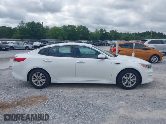2017 Kia Optima LX z VIN 5XXGT4L32HG161091, wystawiony jako IAAI lot #42266149 z przebiegiem 166 254 mil mil oraz . Historia ofert i sprzedaży dostępna na DreamBid. Obrazek 13.