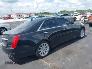 2014 Cadillac CTS RWD with VIN 1G6AP5SX0E0185913, listed as a IAAI auction lot 42685622 with 107,406 mi miles and . Bid and sale history available at DreamBid. Image 4.