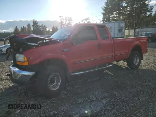 1999 Ford F-250 XL with VIN 1FTNX21S3XEC74609, listed as a Copart auction lot 84040414 with 142,702 mi miles and Salvage title. Bid and sale history available at DreamBid. Image 1.
