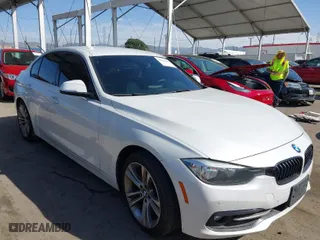 2017 BMW 3 Series 330i with VIN WBA8B9G51HNU51145, listed as a IAAI auction lot 41690107 with 114,555 mi miles. Bid and sale history available at carsss.com. Image 1.