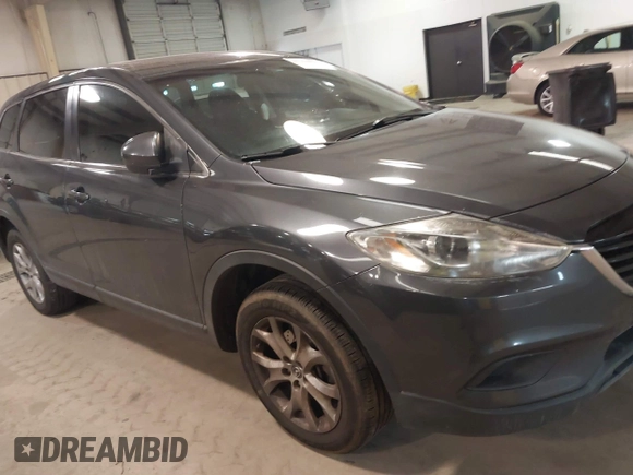 2014 Mazda CX-9 Sport with VIN JM3TB3BV3E0434817, listed as a IAAI auction lot 41394036 with 157,304 mi miles. Bid and sale history available at carsss.com. Image 18.
