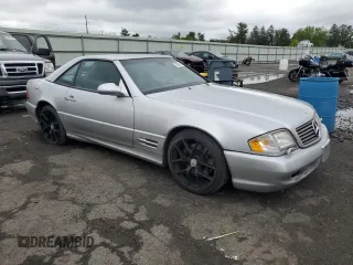 1999 Mercedes-Benz SL 500 with VIN WDBFA68F1XF177603, listed as a Copart auction lot 58983485 with 120,737 mi miles and Salvage title. Bid and sale history available at DreamBid. Image 4.