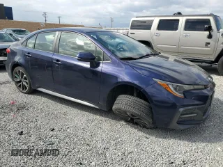 2020 Toyota Corolla SE with VIN JTDS4RCE3LJ006298, listed as a Copart auction lot 50997415 with 74,952 mi miles and Salvage Title. Bid and sale history available at carsss.com. Image 4.
