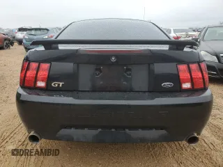 2002 Ford Mustang GT Deluxe with VIN 1FAFP42X42F214888, listed as a Copart auction lot 44379755 with 77,207 mi miles and Salvage Title. Bid and sale history available at carsss.com. Image 6.