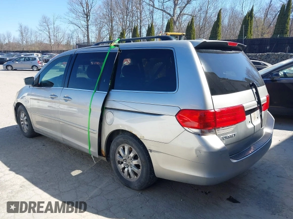2008 Honda Odyssey EX-L with VIN 5FNRL38738B098262, listed as a IAAI auction lot 42061465 with 207,825 mi miles and . Bid and sale history available at DreamBid. Image 3.