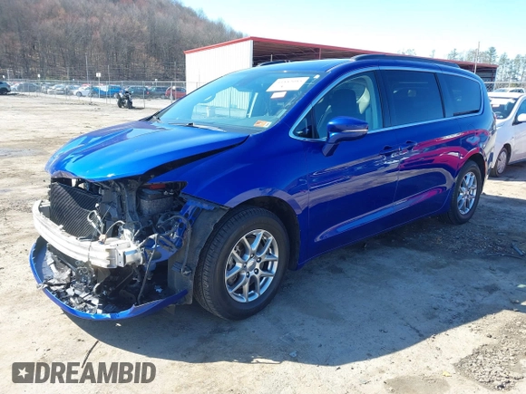 2021 Chrysler Pacifica Touring with VIN 2C4RC1FG5MR511546, listed as a IAAI auction lot 41882085 with 85,635 mi miles and . Bid and sale history available at DreamBid. Image 18.