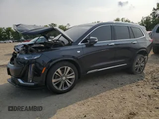 2021 Cadillac XT6 Premium Luxury with VIN 1GYKPDRS9MZ171356, listed as a Copart auction lot 59423805 with 32,719 mi miles and Salvage title. Bid and sale history available at DreamBid. Image 1.