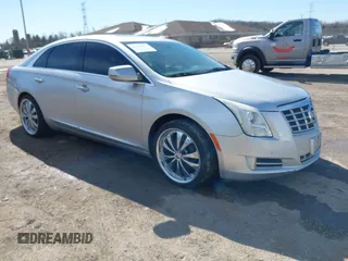 2013 Cadillac XTS Luxury with VIN 2G61R5S34D9233991, listed as a IAAI auction lot 41825533 with 152,706 mi miles. Bid and sale history available at carsss.com. Image 1.