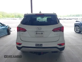2018 Hyundai Santa Fe 2.4L z VIN 5NMZU3LB9JH083018, wystawiony jako IAAI lot #42205310 z przebiegiem 65 504 mil mil oraz . Historia ofert i sprzedaży dostępna na DreamBid. Obrazek 16.