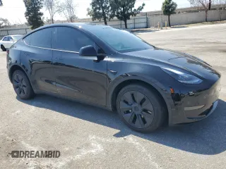2024 Tesla Model Y z VIN 7SAYGDED8RF123516, wystawiony jako Copart lot #55354655 z przebiegiem 12 521 mil mil oraz Szkoda całkowita • Salvage title. Historia ofert i sprzedaży dostępna na DreamBid. Obrazek 4.