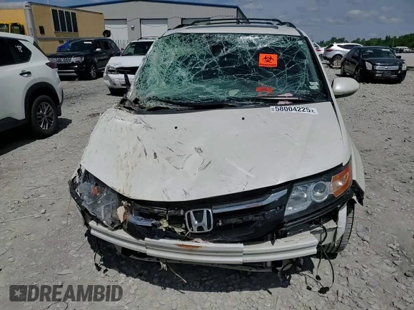 2014 Honda Odyssey Touring with VIN 5FNRL5H98EB053486, listed as a Copart auction lot 58004225 with 201,526 mi miles and Salvage title. Bid and sale history available at DreamBid. Image 15.