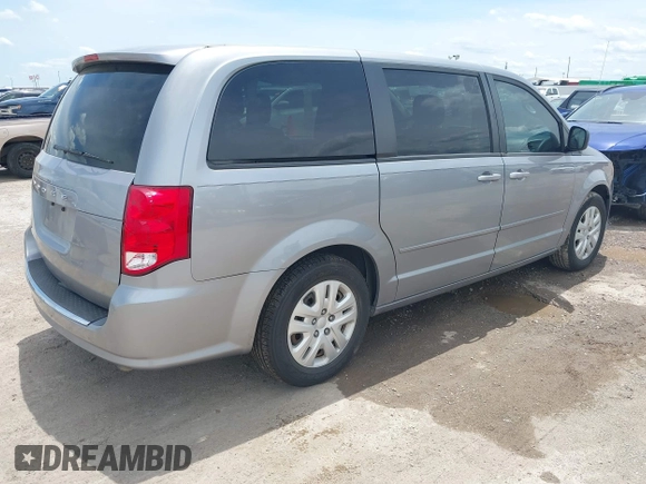 2015 Dodge Grand Caravan American Value with VIN 2C4RDGBGXFR542672, listed as a IAAI auction lot 42230608 with 102,753 mi miles and . Bid and sale history available at DreamBid. Image 4.