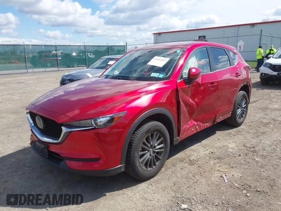 2021 Mazda CX-5 Touring z VIN JM3KFBCM1M0401717, wystawiony jako IAAI lot #42036407 z przebiegiem 35 587 mil mil oraz . Historia ofert i sprzedaży dostępna na DreamBid. Obrazek 17.