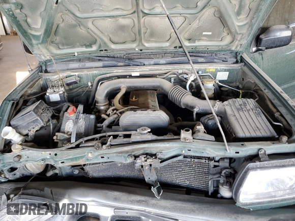 2002 Isuzu Rodeo z VIN 4S2CK58DX24320793, wystawiony jako Copart lot #46357065 z przebiegiem 180 306 mil mil oraz Szkody całkowita. Historia ofert i sprzedaży dostępna na DreamBid. Obrazek 12.