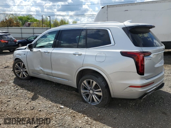 2020 Cadillac XT6 AWD Premium Luxury z VIN 1GYKPDRS0LZ122836, wystawiony jako Copart lot #49836373 z przebiegiem Nie podano mil oraz . Historia ofert i sprzedaży dostępna na DreamBid. Obrazek 2.