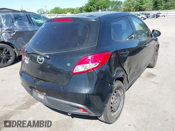 2012 Mazda 2 Sport with VIN JM1DE1KZ0C0146875, listed as a IAAI auction lot 41974461 with 211,414 mi miles. Bid and sale history available at carsss.com. Image 4.