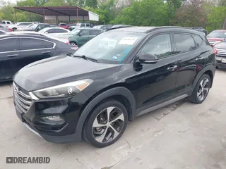 2017 Hyundai Tucson Value with VIN KM8J33A26HU362363, listed as a IAAI auction lot 41940376 with 127,986 mi miles. Bid and sale history available at carsss.com. Image 2.