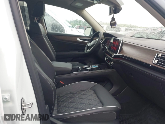 2024 Volkswagen Atlas SEL Premium R-Line with VIN 1V2FR2CA0RC598455, listed as a IAAI auction lot 42060180 with 2,865 mi miles and . Bid and sale history available at DreamBid. Image 5.