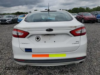 2015 Ford Fusion SE Hybrid с VIN 3FA6P0LU2FR120126, выставлен на аукционе Copart как лот 57130185 с пробегом 55 792 миль миль и Чистый • Clean title. История ставок и продаж доступна на DreamBid. Изображение 6.