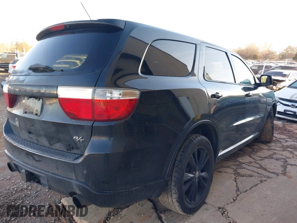 2013 Dodge Durango R/T z VIN 1C4SDHCT5DC558951, wystawiony jako IAAI lot #41590515 z przebiegiem 150 985 mil mil oraz . Historia ofert i sprzedaży dostępna na DreamBid. Obrazek 4.