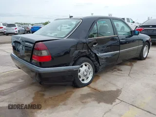 2000 Mercedes-Benz C 230 Kompressor z VIN WDBHA24G9YA851219, wystawiony jako IAAI lot #42392855 z przebiegiem 119 588 mil mil oraz . Historia ofert i sprzedaży dostępna na DreamBid. Obrazek 4.