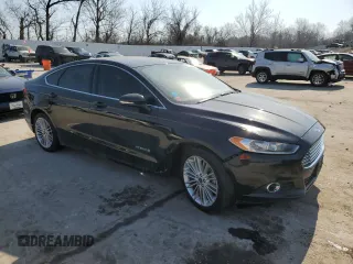 2014 Ford Fusion SE Hybrid with VIN 3FA6P0LU4ER343718, listed as a Copart auction lot 48021865 with 105,282 mi miles and Salvage Title. Bid and sale history available at carsss.com. Image 4.