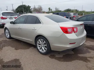 2015 Chevrolet Malibu LTZ with VIN 1G11F5SL3FF328986, listed as a IAAI auction lot 41578501 with 147,998 mi miles. Bid and sale history available at carsss.com. Image 3.