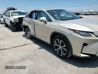 2016 Lexus RX 350 с VIN 2T2ZZMCA5GC027635, выставлен на аукционе Copart как лот 62029095 с пробегом 80 609 миль миль и Списание • Salvage title. История ставок и продаж доступна на DreamBid. Изображение 14.