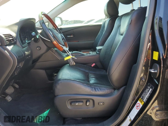 2011 Lexus RX 450h with VIN JTJBC1BAXB2034849, listed as a Copart auction lot 62915265 with 168,558 mi miles and Salvage title. Bid and sale history available at DreamBid. Image 7.