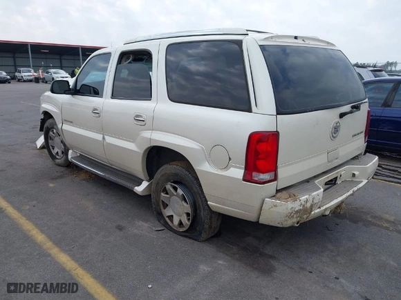 2002 Cadillac Escalade with VIN 1GYEK63N62R157941, listed as a IAAI auction lot 41514656 with 273,731 mi miles. Bid and sale history available at carsss.com. Image 3.