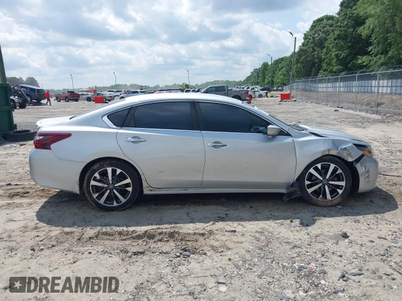 2017 Nissan Altima SR z VIN 1N4AL3AP8HC257299, wystawiony jako IAAI lot #42312909 z przebiegiem 50 154 mil mil oraz . Historia ofert i sprzedaży dostępna na DreamBid. Obrazek 13.