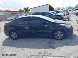 2015 Hyundai Elantra Limited with VIN KMHDH4AE7FU385081, listed as a IAAI auction lot 41911165 with 124,052 mi miles. Bid and sale history available at carsss.com. Image 6.