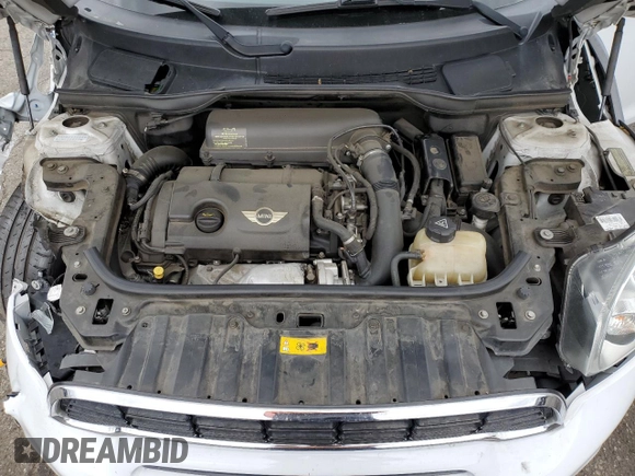 2013 MINI Countryman S with VIN WMWZC3C54DWP24877, listed as a Copart auction lot 53583655 with 97,734 mi miles and Salvage title. Bid and sale history available at DreamBid. Image 11.