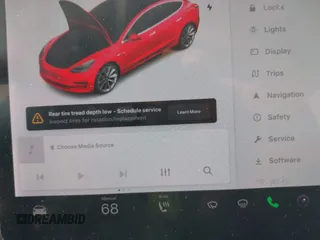 2020 Tesla Model 3 Standard Range Plus with VIN 5YJ3E1EA9LF708808, listed as a IAAI auction lot 40018323 with 32,069 mi miles. Bid and sale history available at carsss.com. Image 18.