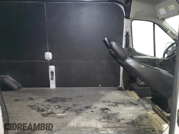 2023 Ford Transit Cargo с VIN 1FTBR2C80PKC00192, выставлен на аукционе Copart как лот 82952724 с пробегом 30 783 миль миль и Чистый • Clean title. История ставок и продаж доступна на DreamBid. Изображение 11.