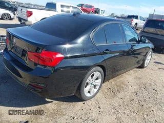 2016 BMW 3 Series 328i xDrive with VIN WBA8E3G55GNU05594, listed as a IAAI auction lot 41634350 with 63,810 mi miles. Bid and sale history available at carsss.com. Image 4.