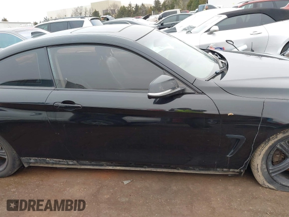 2014 BMW 4 Series 428i with VIN WBA3N7C50EF718339, listed as a IAAI auction lot 41403096 with 143,478 mi miles and . Bid and sale history available at carsss.com. Image 14.
