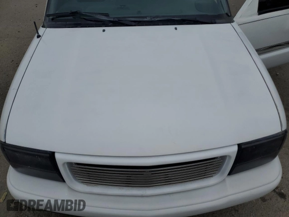 2000 GMC Sonoma SLS z VIN 1GTCS19W8Y8176036, wystawiony jako Copart lot #78777564 z przebiegiem 159 084 mil mil oraz Szkody całkowita. Historia ofert i sprzedaży dostępna na DreamBid. Obrazek 11.