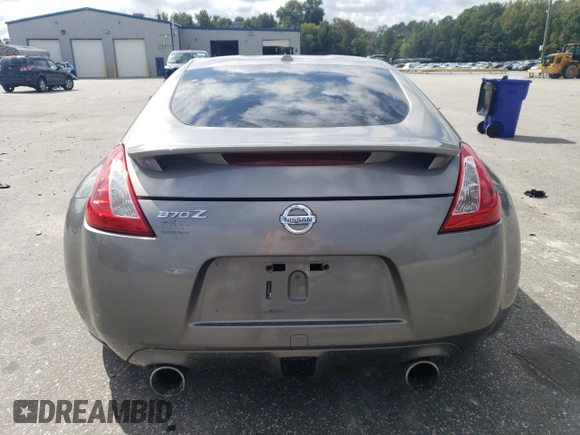 2010 Nissan 370Z Touring with VIN JN1AZ4EH8AM501134, listed as a Copart auction lot 73919614 with 106,599 mi miles and Salvage Title. Bid and sale history available at carsss.com. Image 6.