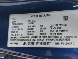 2022 Tesla Model 3 with VIN 5YJ3E1EA7NF188417, listed as a IAAI auction lot 41885623 with 105,457 mi miles and . Bid and sale history available at DreamBid. Image 9.